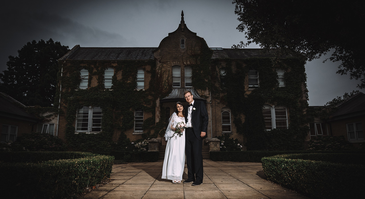 Bridal couple in front of hotel